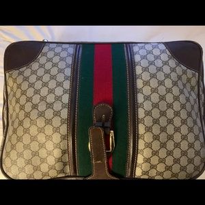 Unisex Vintage Gucci suitcase.